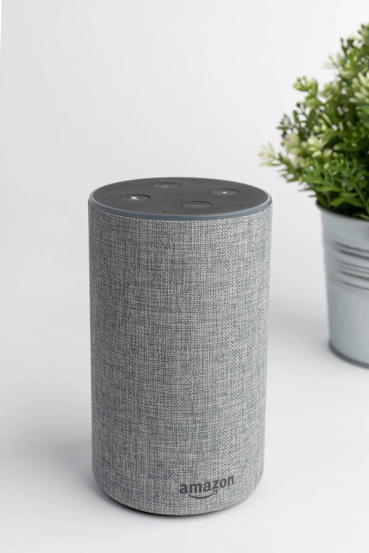 Featured image for VEO 2026: Make Siri, Alexa & Google Read Your Website Smart speaker on a wooden surface representing voice assistants like Alexa, Siri, and Google Assistant