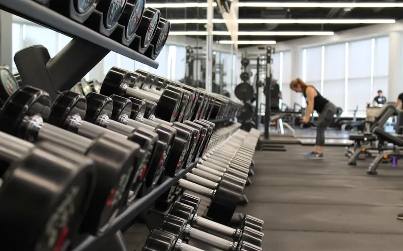 Fitness & Wellness Studios Fitness studio with members participating in a group workout class