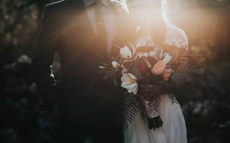 Wedding & Event Services Elegant wedding venue setup with floral arrangements and table decorations